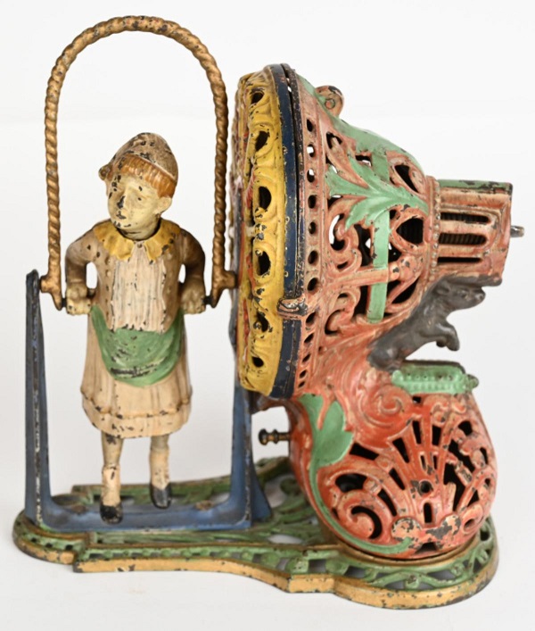 Milestone auction – Girl Skipping Rope cast iron mechanical bank
